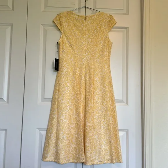 Tommy Hilfiger Dress  Fit and Flare size 10 cap sleeves daffodil with ivory lace